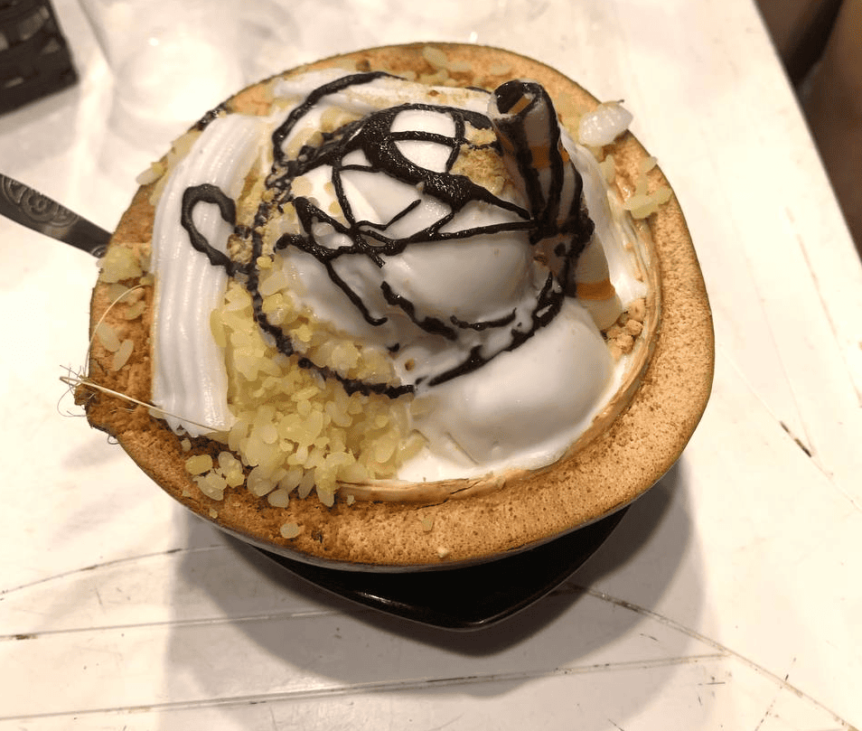 Eat Kem Dua Ma Lai (Coconut Cream) in Da Nang Food Tours by Motorbike - operated by Da Nang X.o Food Tours.